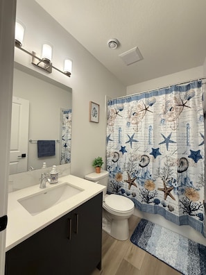 Hair dryer, towels, soap, toilet paper