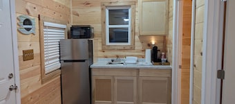 Charming 1-bedroom Log Cabin on Lake Jordan with water front, large deck ,AC,