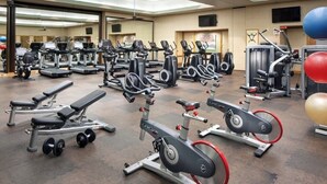A spacious gym with various cardio machines, weight stations, and exercise balls. - Beautiful Ocean View Studio at Marriott Kauai Beach Club (Knoxville)