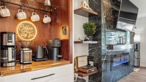 A modern kitchen with a coffee station, marble backsplash, and a neon sign. - Pac-Man fun, pet-friendly comfort, and cozy vibes near Downtown Edmonton (Edmonton)