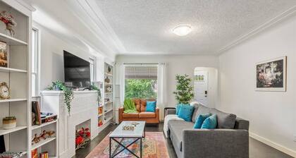 Big, fun-filled stay steps from Whyte Ave with yard, games, and coffee bar