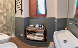 Hair dryer, towels, soap, toilet paper