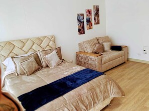 1 غرفة نوم ومكواة/لوح كي وخدمة الإنترنت وملاءات أسرّة