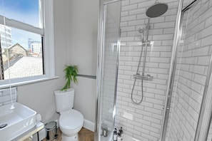 Shower, free toiletries, hair dryer, towels