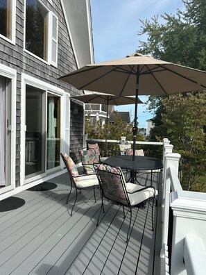 Outdoor dining - Serene Waterfront 3-BR house with Loft, 1 mile walk to Charlestown beach (Charlestown)