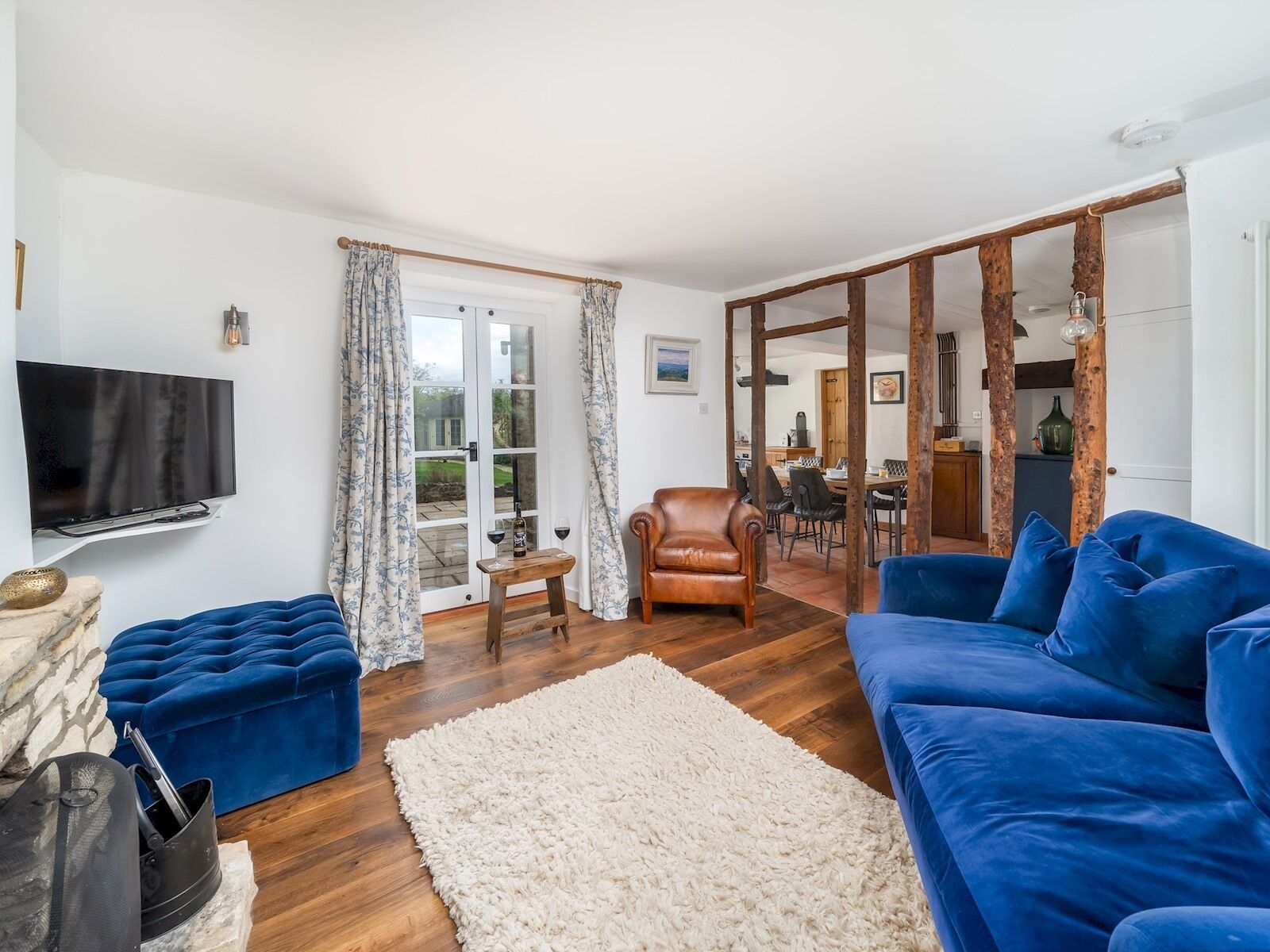 TV, fireplace, books