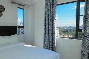 1 غرفة نوم ومكواة/لوح كي وخدمة الإنترنت وملاءات أسرّة