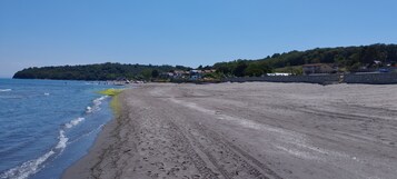Playa privada, camas de playa gratis, sillas reclinables de playa