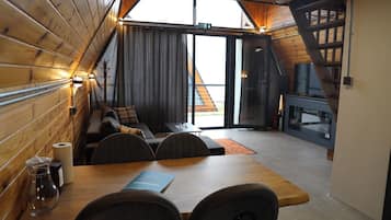 Bungalow, Sea View | Living room | 120-inch flat-screen TV with satellite channels, fireplace