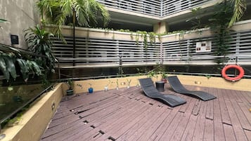 Outdoor pool, open 9:00 AM to 9:00 PM, sun loungers