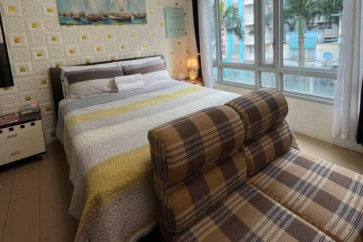 Desk, laptop workspace, blackout curtains, free WiFi