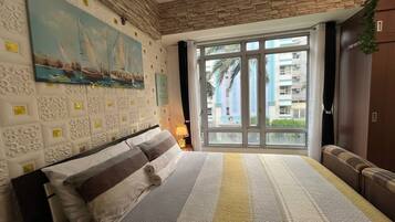 Desk, laptop workspace, blackout curtains, free WiFi