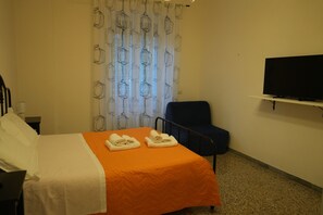 2 habitaciones, tabla de planchar con plancha, wifi y ropa de cama 