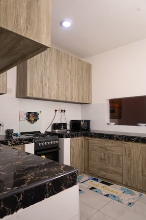 Fridge, microwave, oven, electric kettle