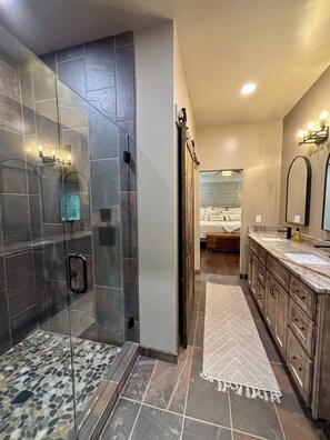 Shower, hair dryer, towels, toilet paper