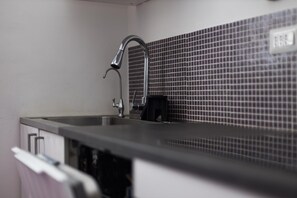 Frigorífic, microones, forn i placa de cuina