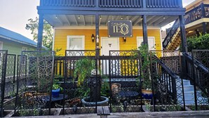 A two-story building with a balcony and a sign reading "Casa de TEO". - Casa de Teo (St. Augustine)