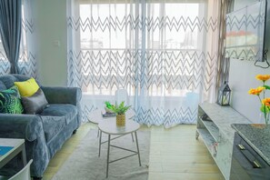 Economy Apartment, Balcony, City View | Living area
