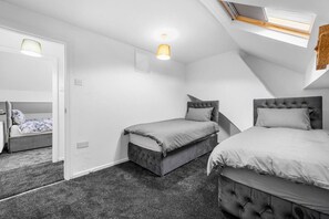 3 bedrooms, desk, iron/ironing board, travel cot