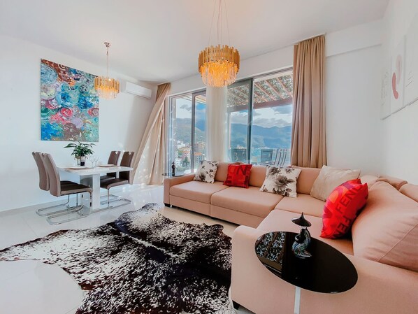 Superior Apartment, Sea View | Living area | 42-inch LCD TV with satellite channels