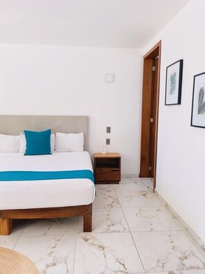 Suite de lujo | Ropa de cama de alta calidad y caja de seguridad en la habitación 