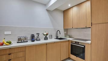 Apartment | Private kitchen | Cleaning supplies