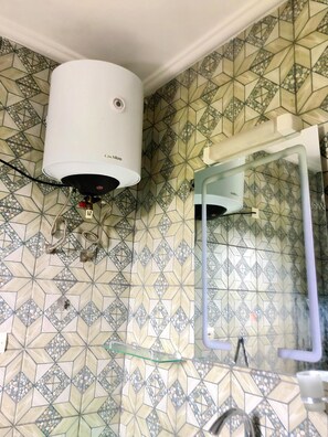 Bidet, towels, soap, toilet paper