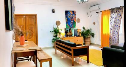 Apartment decorated with natural plants and artistic paintings.