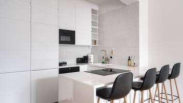 Superior Apartment, 1 Queen Bed with Sofa bed, City View | Private kitchen | Full-size fridge, microwave, oven, stovetop