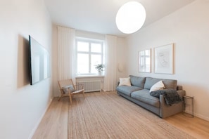 Superior Apartment, 1 Queen Bed with Sofa bed, City View | Living area | 40-inch flat-screen TV with cable channels