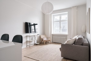 Superior Apartment, 1 Queen Bed with Sofa bed, City View | Living area | 40-inch flat-screen TV with cable channels
