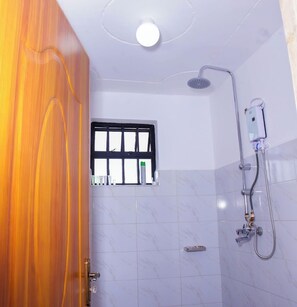Classic Apartment, City View | Bathroom | Shower, free toiletries, slippers, towels - Lux Suites The Urbanite Apartments (Kitengela)