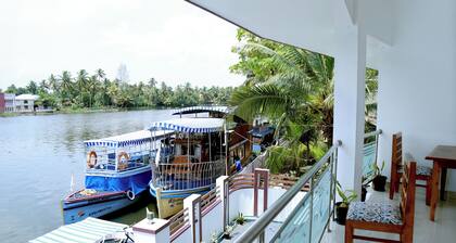 Riveria Adventures Waterfront Resorts with modern comfort & paddy-view stays