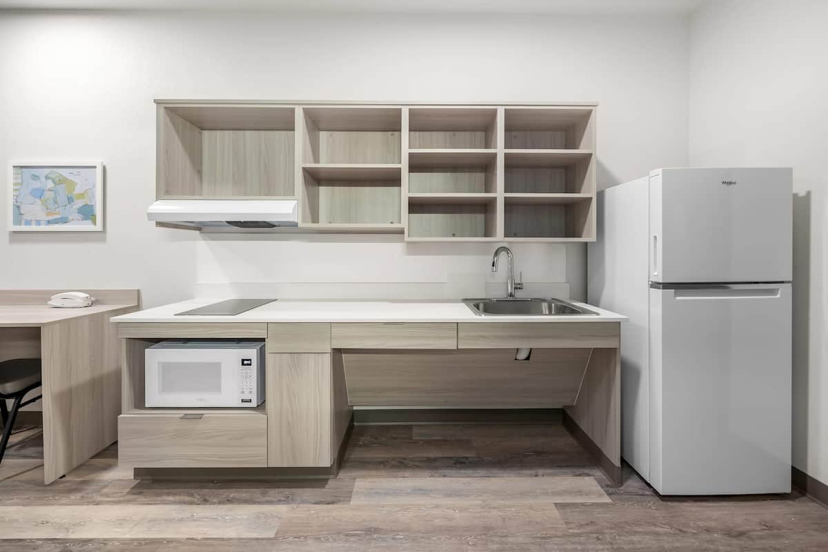 Suite, 1 Queen Bed, Roll-in Shower, Non Smoking | Desk, blackout curtains, free WiFi, bed sheets