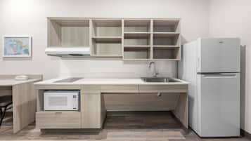 Suite, 1 Queen Bed, Roll-in Shower, Non Smoking | Private kitchen | Full-size fridge, microwave, stovetop