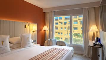 Ropa de cama de alta calidad y minibar