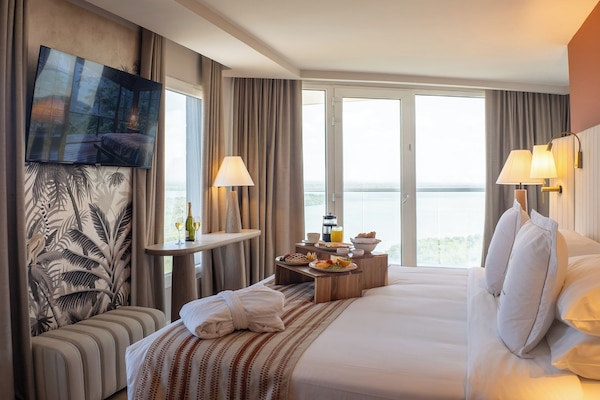 Ropa de cama de alta calidad y minibar