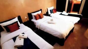 1 quarto, acesso à internet, roupa de cama