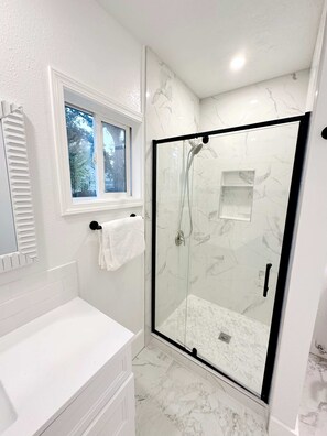 Hair dryer, towels, soap, shampoo