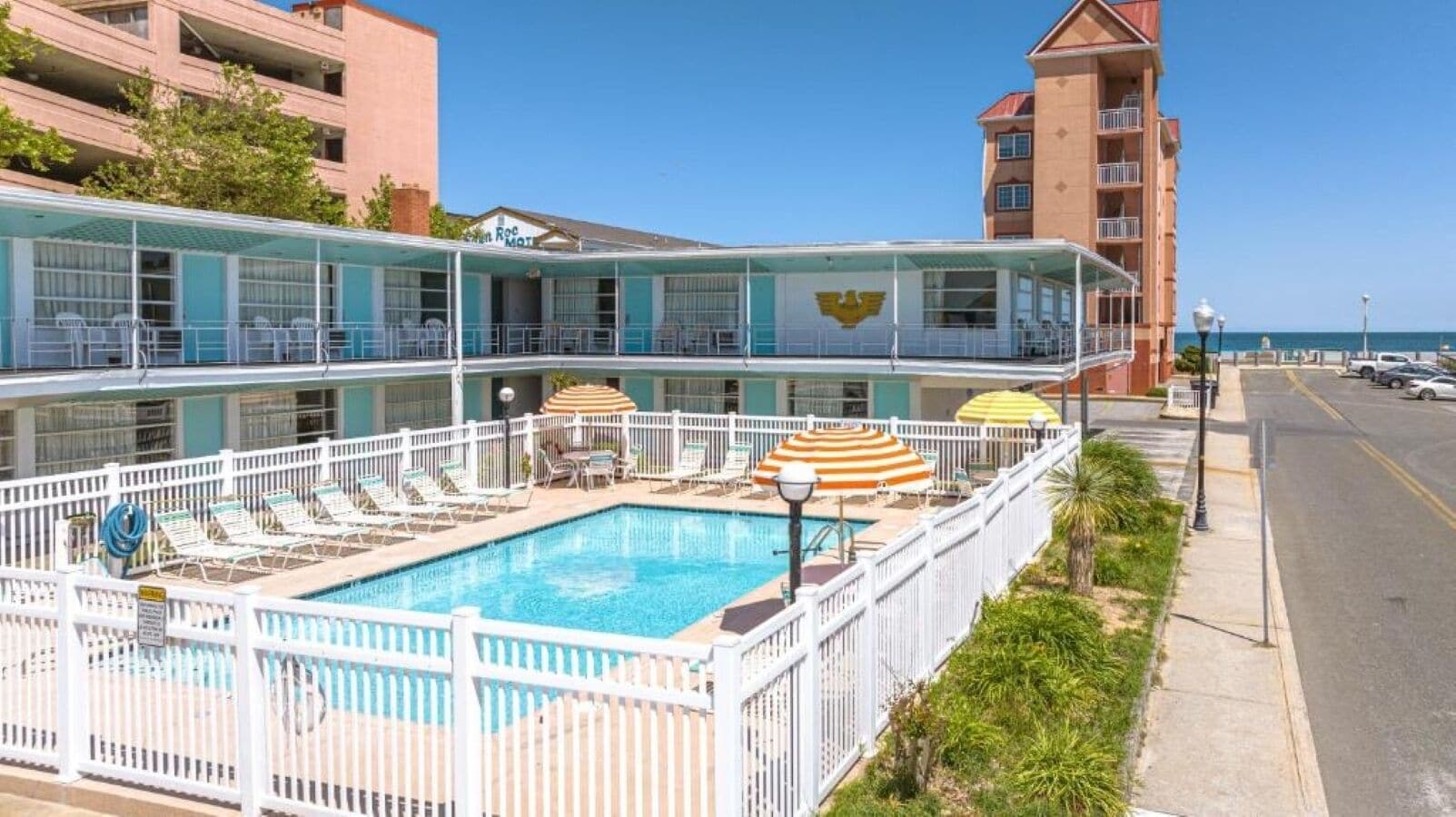 Seasonal outdoor pool, open 9:00 AM to 9:00 PM, pool umbrellas