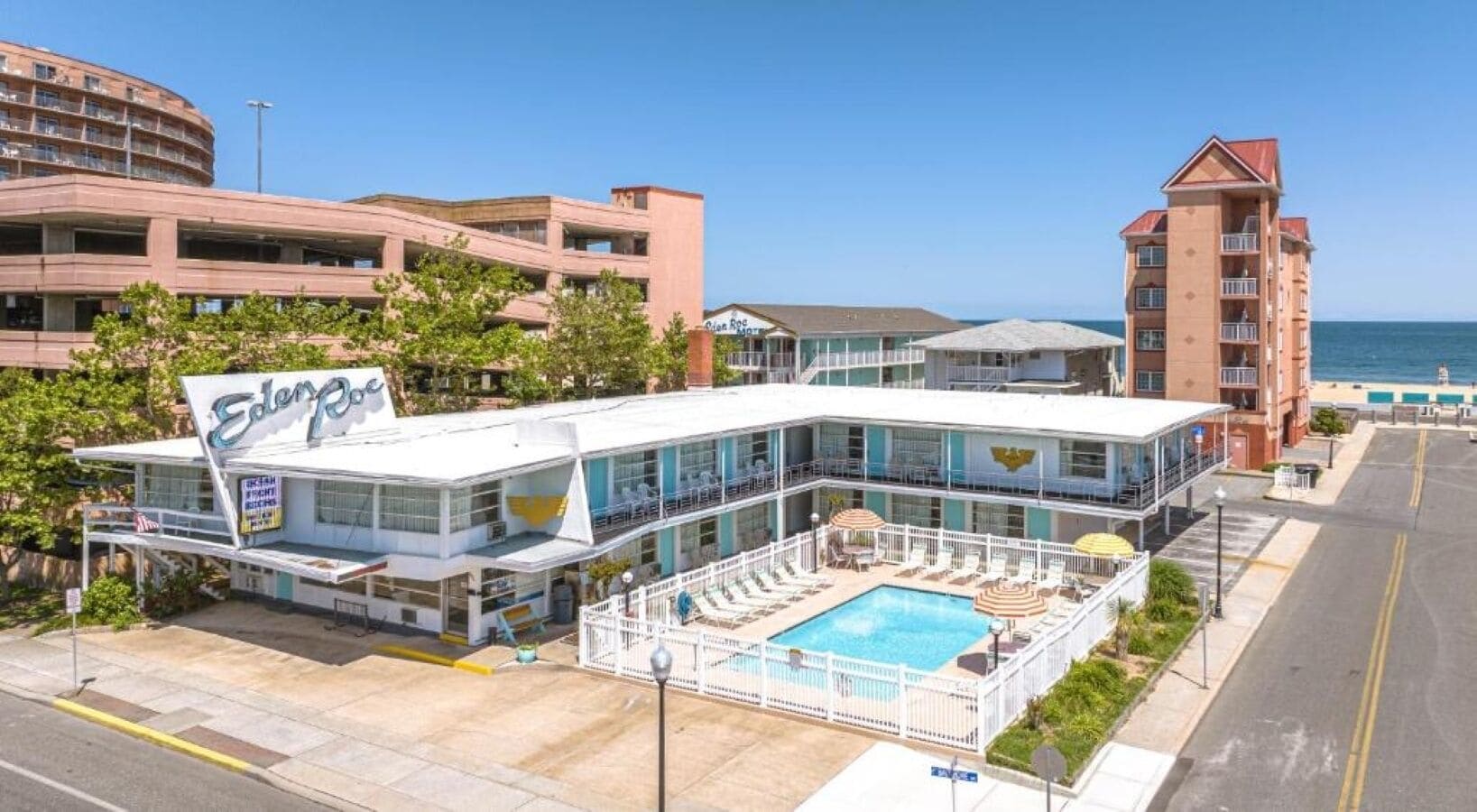 Seasonal outdoor pool, open 9:00 AM to 9:00 PM, pool umbrellas