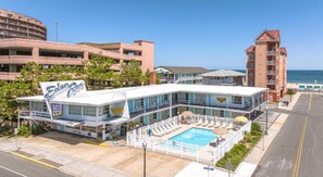 Seasonal outdoor pool, open 9:00 AM to 9:00 PM, pool umbrellas - Eden Roc Motel (Ocean City)