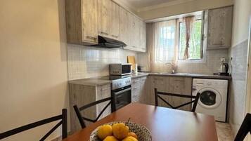 Apartment, Garden View | Private kitchen | Electric kettle