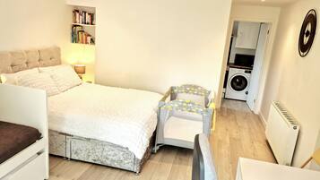 1 bedroom, desk, iron/ironing board, travel cot