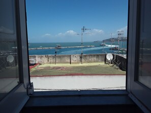 Interior - MARGIE HOUSE SEAVIEW ROOM Quadruple room with a sea view of Procida harbor.  (Procida)