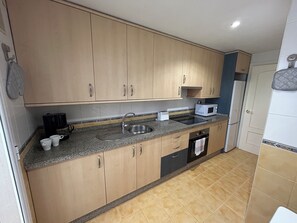 Microwave, oven, stovetop - Cozy Apartment (Benalmádena)