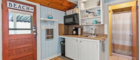 Fridge, coffee/tea maker, cookware/dishes/utensils