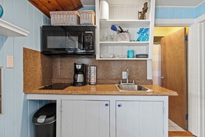 Fridge, coffee/tea maker, cookware/dishes/utensils