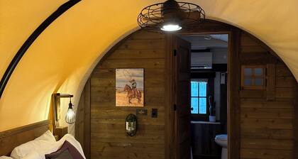 Covered Glamping Wagons: Step Into the Frontier With Modern Comforts