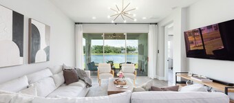 Stylish waterside retreat - springs nearby - pool and gym access - large groups